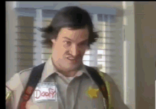 63042-officer-doofy-doofy-gilmore-gif